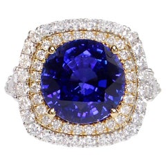 Anello di tanzanite con diamanti 7,2 carati totali in oro 18 carati