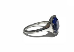 Tanzanite Ring on 18 Karat White Gold with Diamond Halo