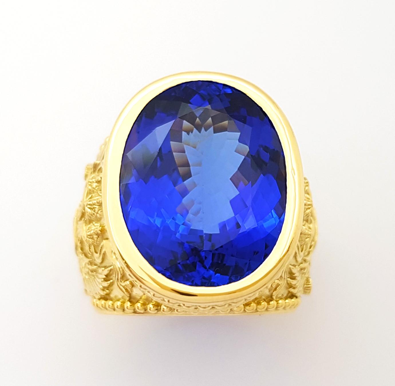 Bague en tanzanite sertie dans de l'or 18K en vente 8