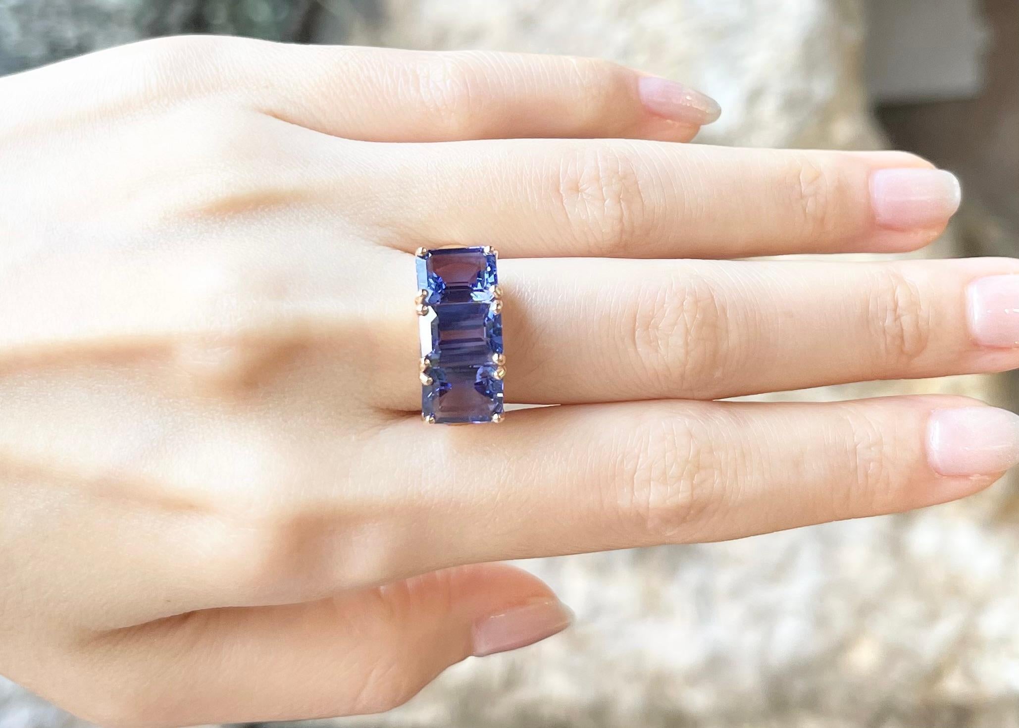 Contemporary Tanzanite Ring set in 18K Rose Gold Settings For Sale