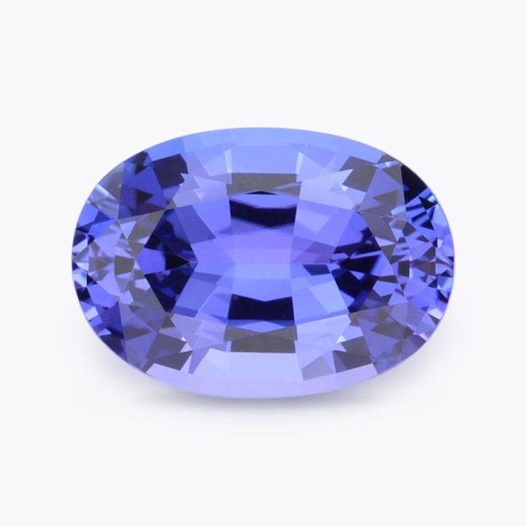 Contemporary 13.36-Carat Oval Tanzanite: Vibrant Gem for Luxury Custom Jewelry Creations For Sale