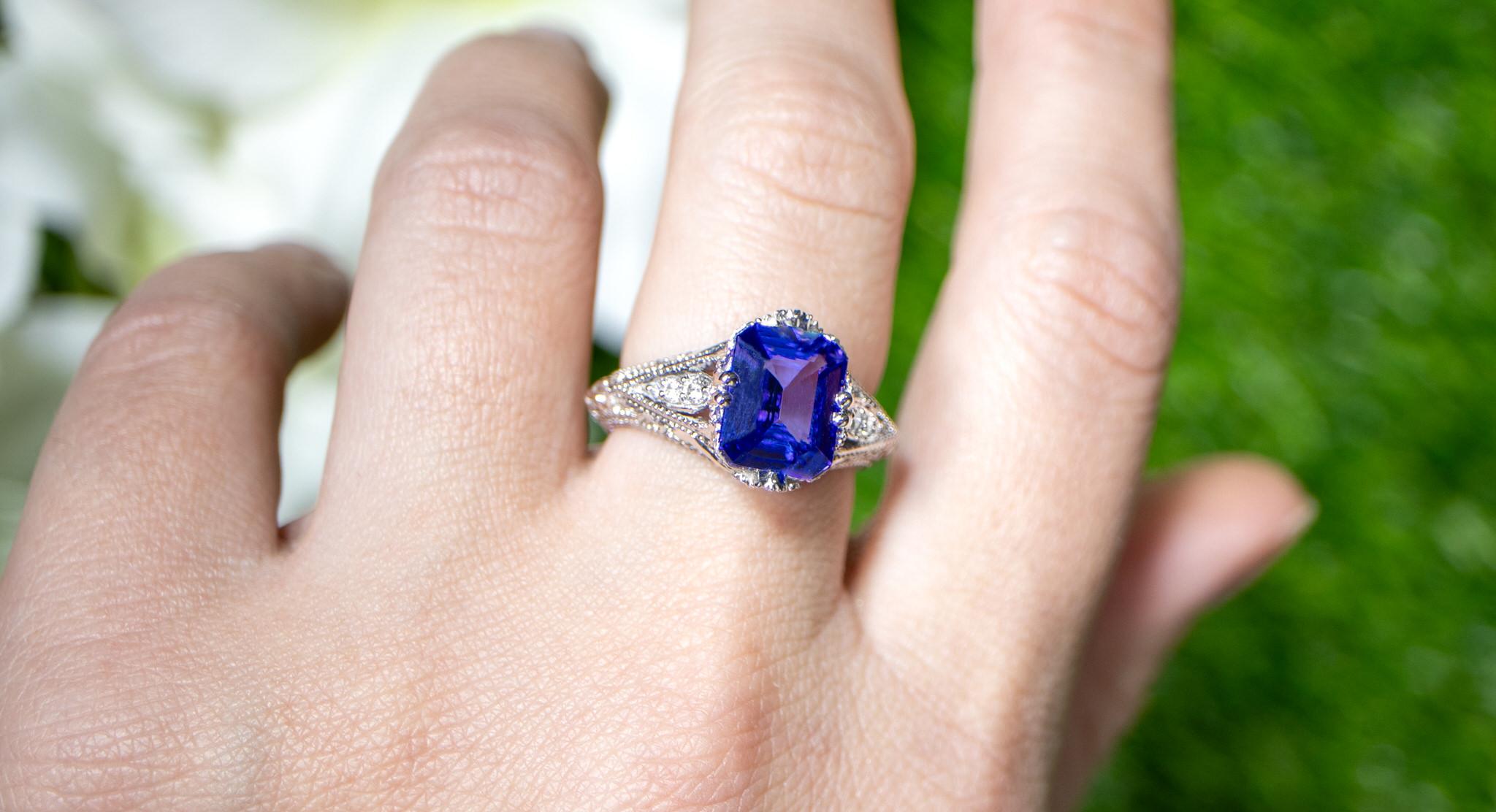 Octagon Cut Tanzanite Ring With Diamond Setting 3.24 Carats 18K Gold For Sale