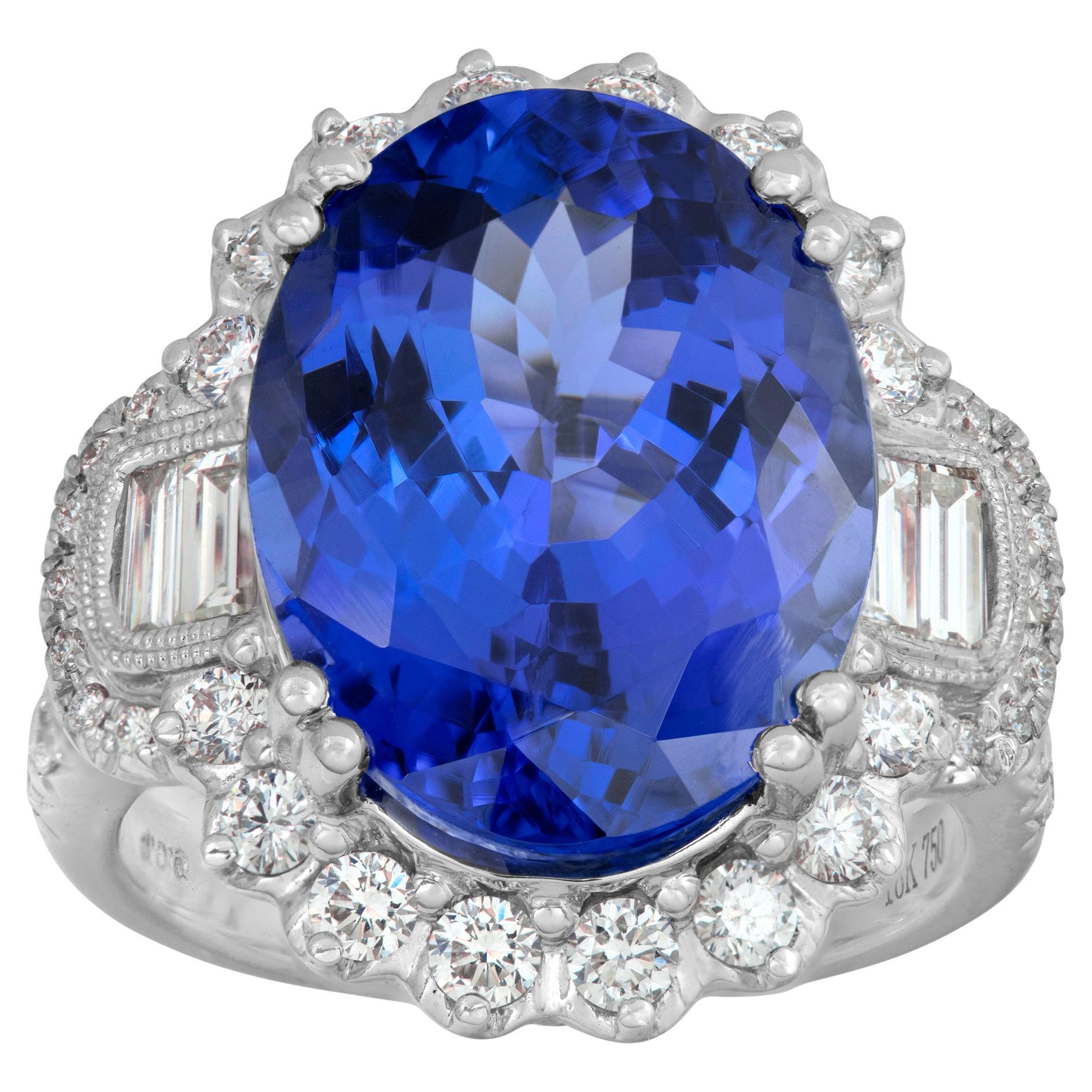 Tanzanite ring with diamonds in white gold with yellow gold accents