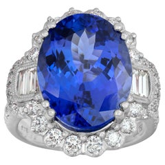 Used Tanzanite ring with diamonds in white gold with yellow gold accents