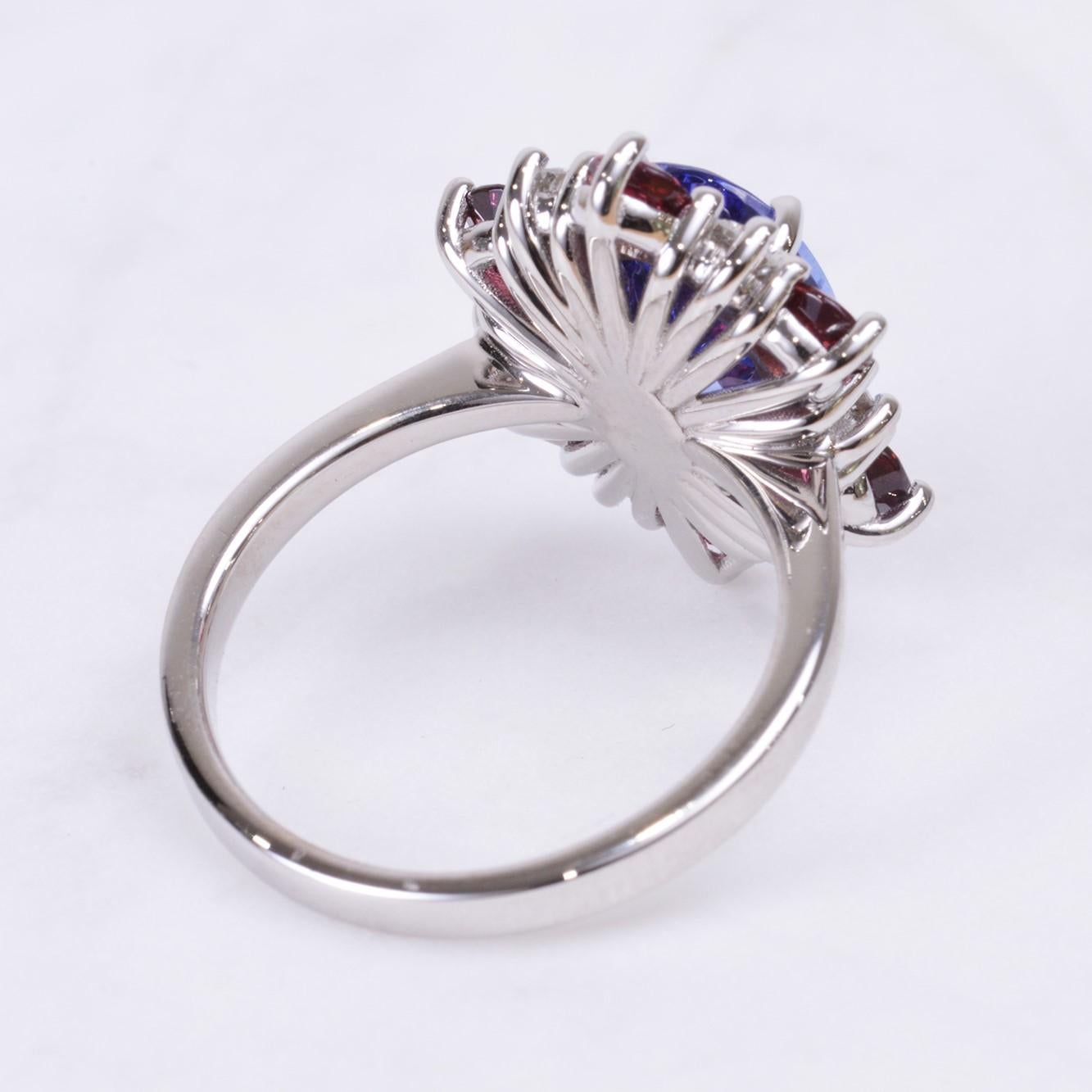 Oval Cut Tanzanite Ring with Rhodolite Garnet and Diamond Halo in White Gold For Sale