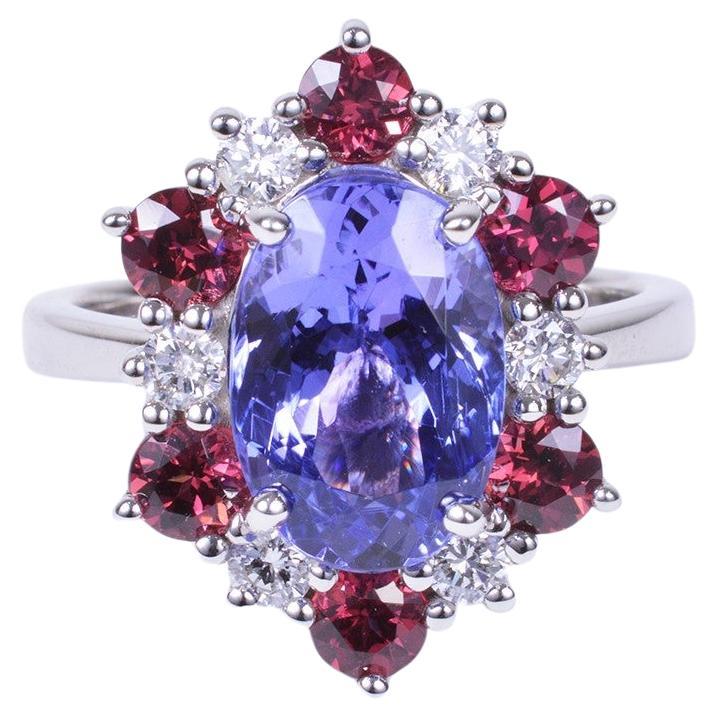 Tanzanite Ring with Rhodolite Garnet and Diamond Halo in White Gold For Sale