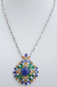 Tanzanite, Sapphires, Emeralds, Diamonds, 18 Karat White Gold Pendant Necklace.