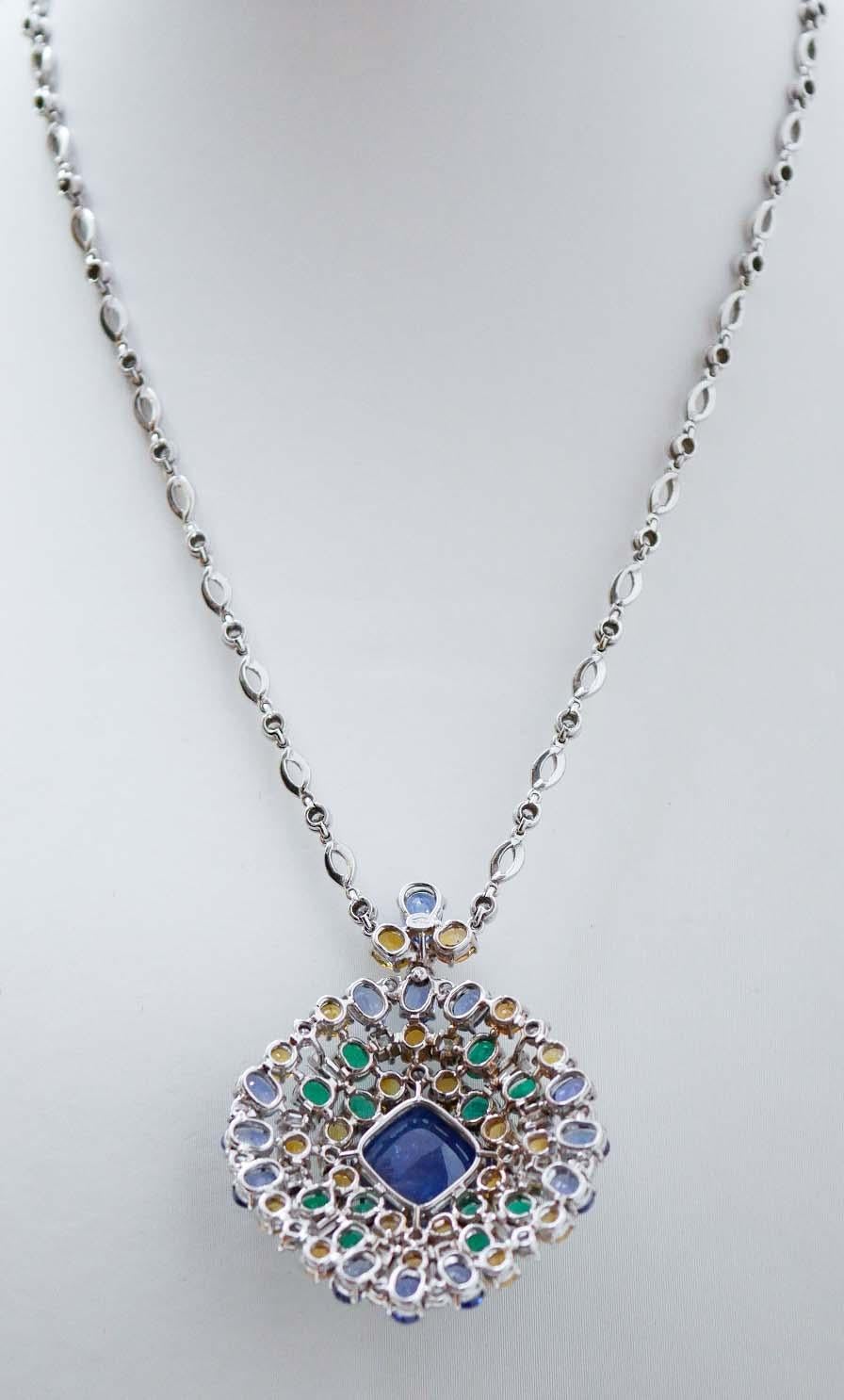 Mixed Cut Tanzanite, Sapphires, Emeralds, Diamonds, 18 Karat White Gold Pendant Necklace. For Sale