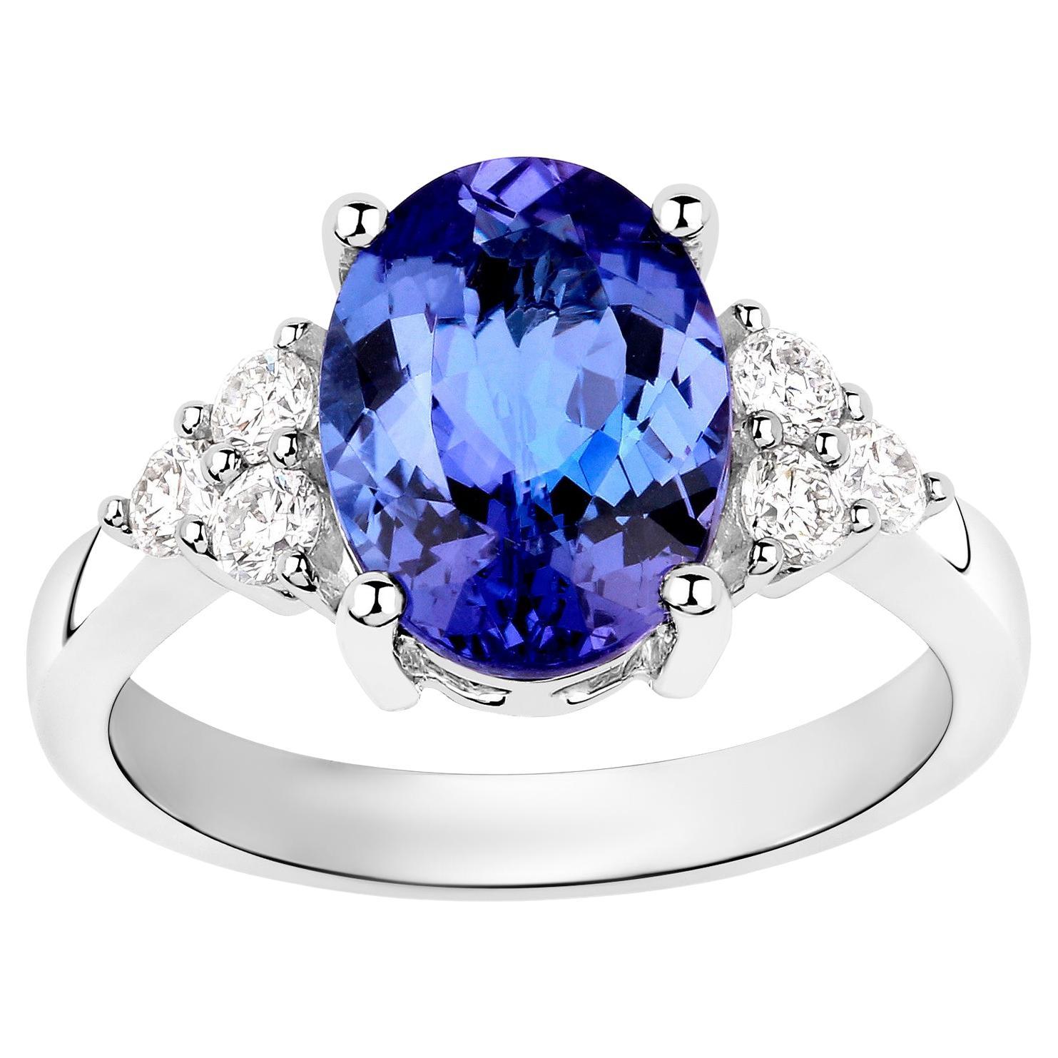 Tanzanite Solitaire Ring 3.9 Carats Diamond Setting 14K White Gold For Sale