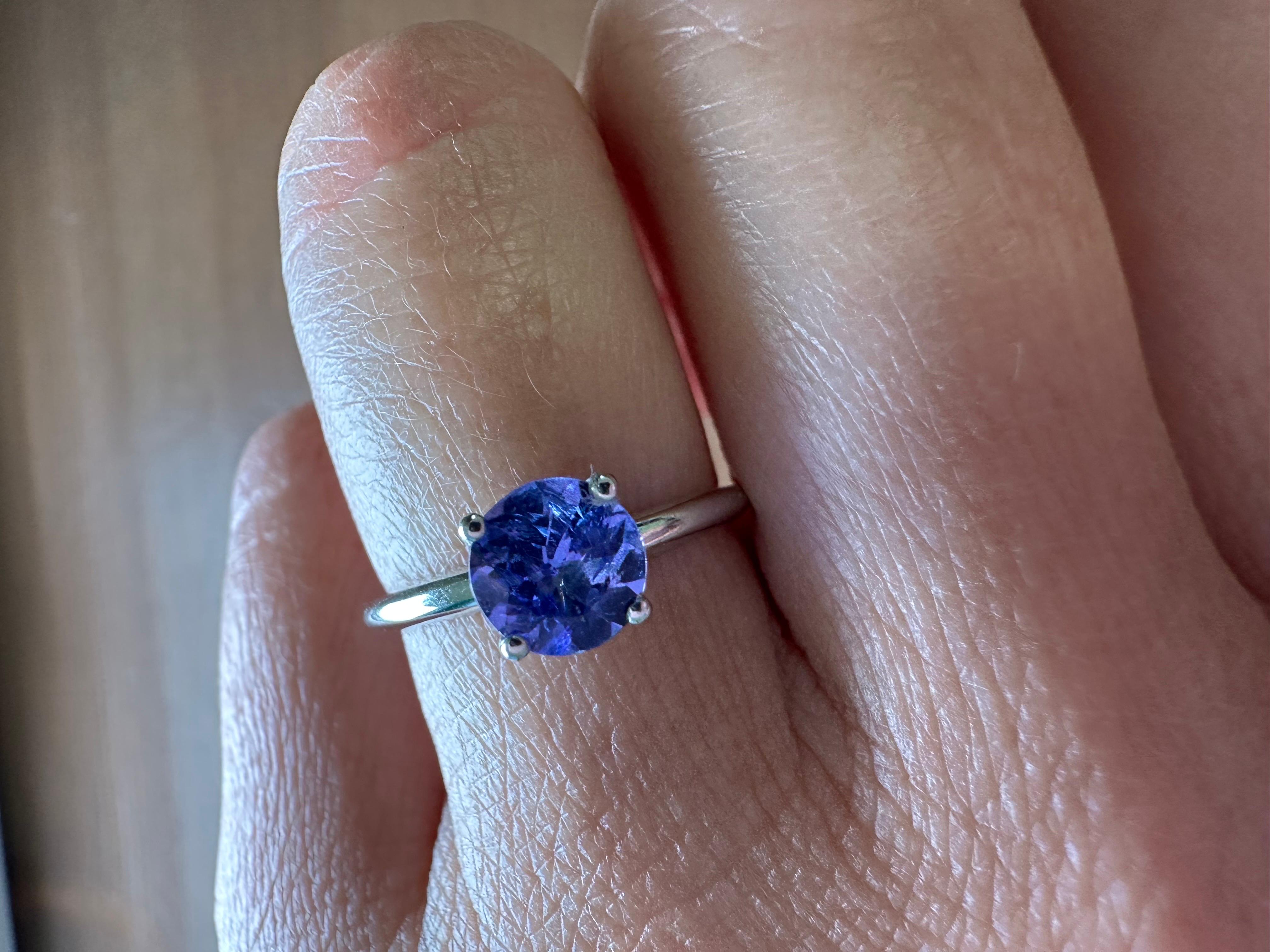 Modern solitaire ring with 1ct tanzanite in 14KT white gold!

Metal Type: 14KT

Natural Tanzanite(s):
Color: Violet
Cut:Round
Carat: 1.02ct
Clarity: Moderately Included

Certificate of authenticity comes with purchase

ABOUT US
We are a family-owned
