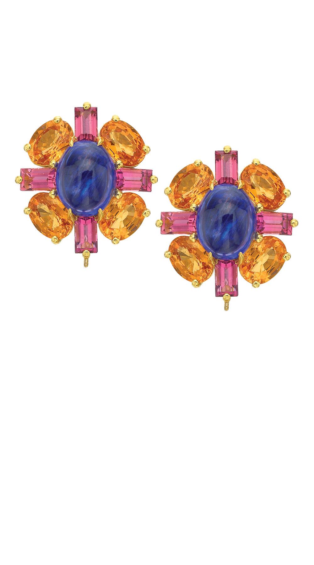 Breathtaking colors in the convertible earrings that include 25.65 carats of vivid Oval and Pear Shaped Cabochon Tanzanites and 10.03 carats of Oval faceted Spessartite Garnets. These are complimented with 3.15 carats of Baguette and Round Pink