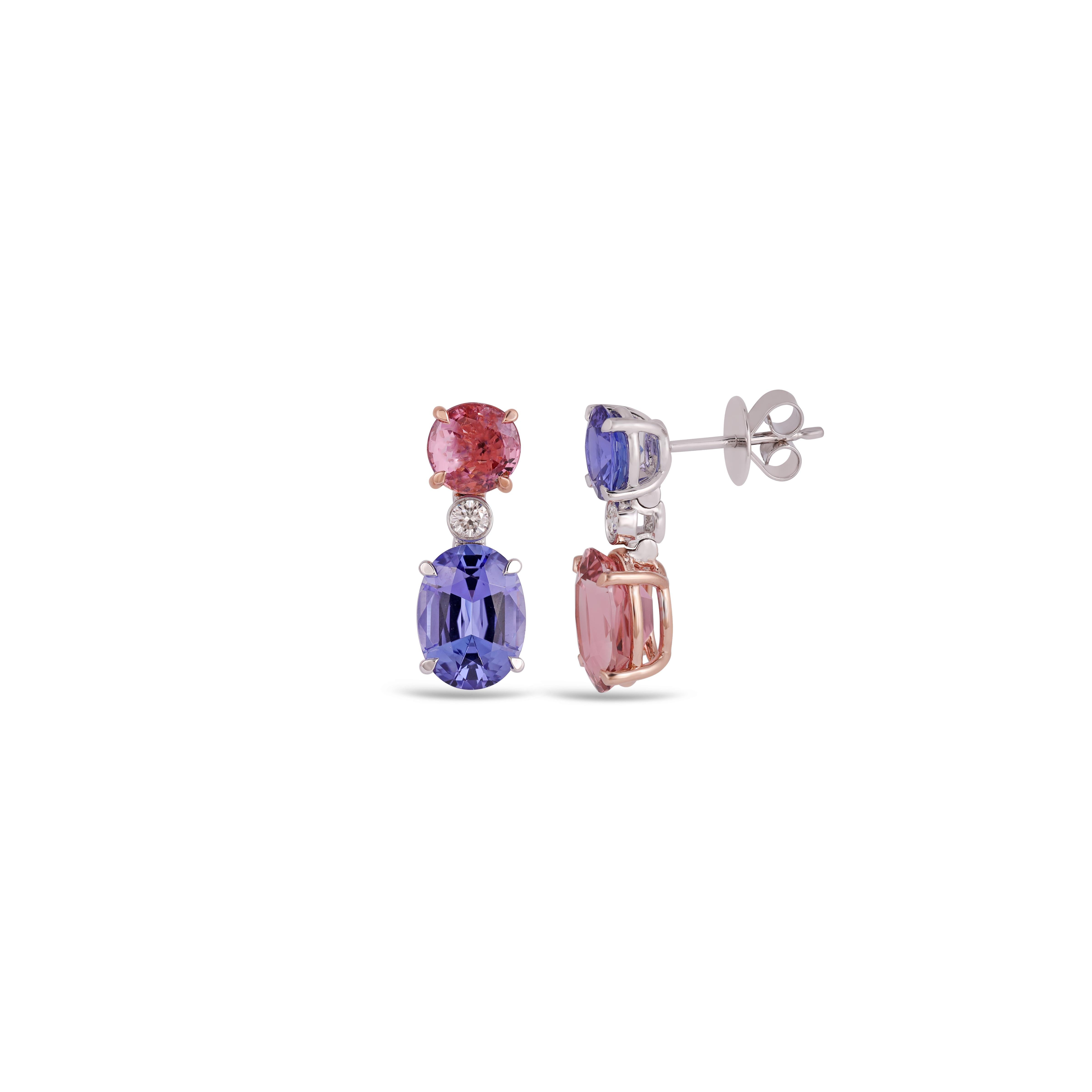 If you are looking for Tanzanite, Spinel, Tourmaline and Diamond  earrings, this is the ultimate find, 1.78 carats of the finest Spinel, Tanzanite 4.71 Carat, Tourmaline 3.33 Carat . Perfectly matched in color and size. 
Diamonds 0.20 Carat.
