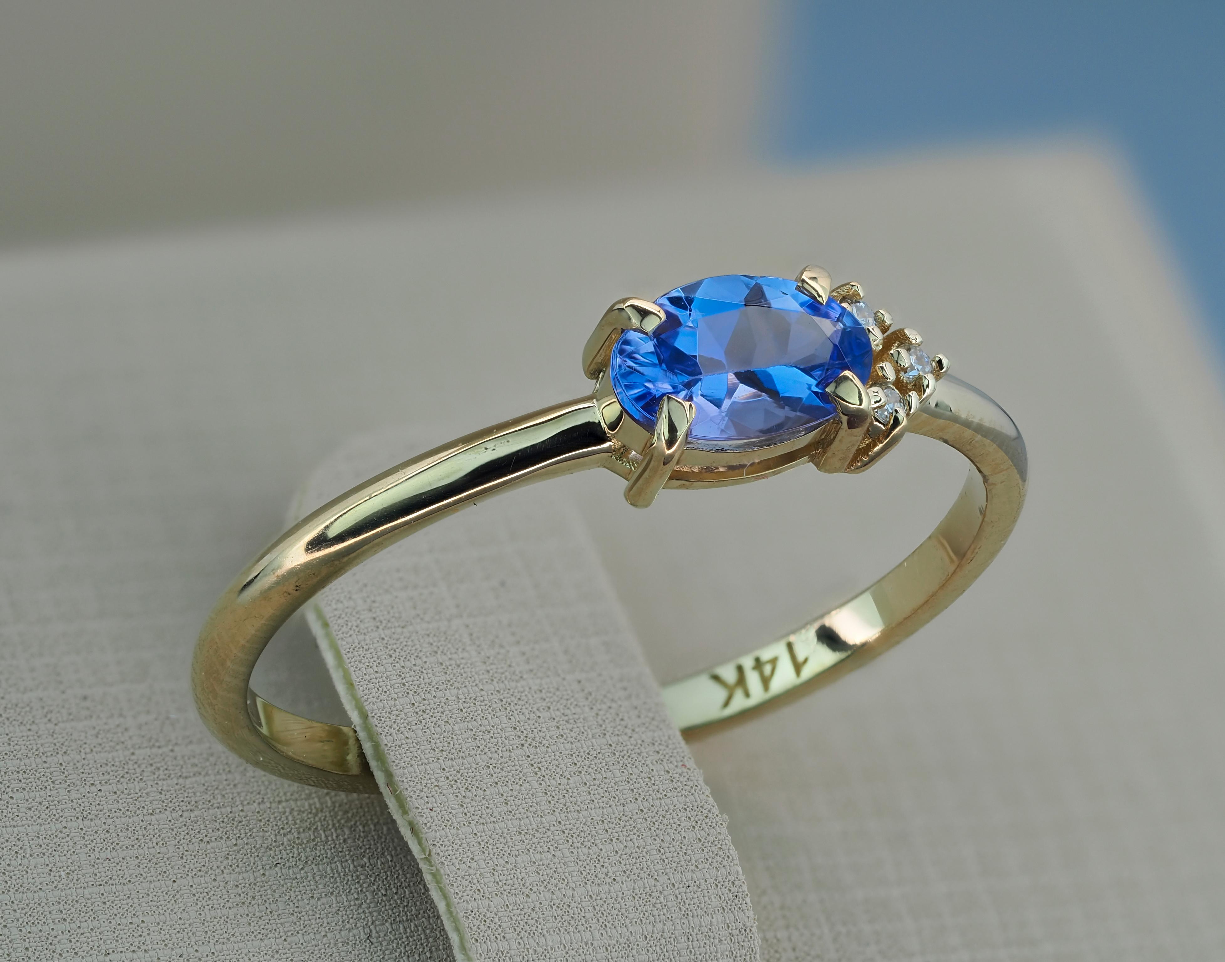 Oval Cut Tanzanite stackable 14k gold ring.  For Sale