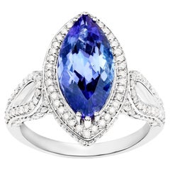 Bague d'exception en or 14 carats avec tanzanite sertie de 4,8 carats au total et diamants