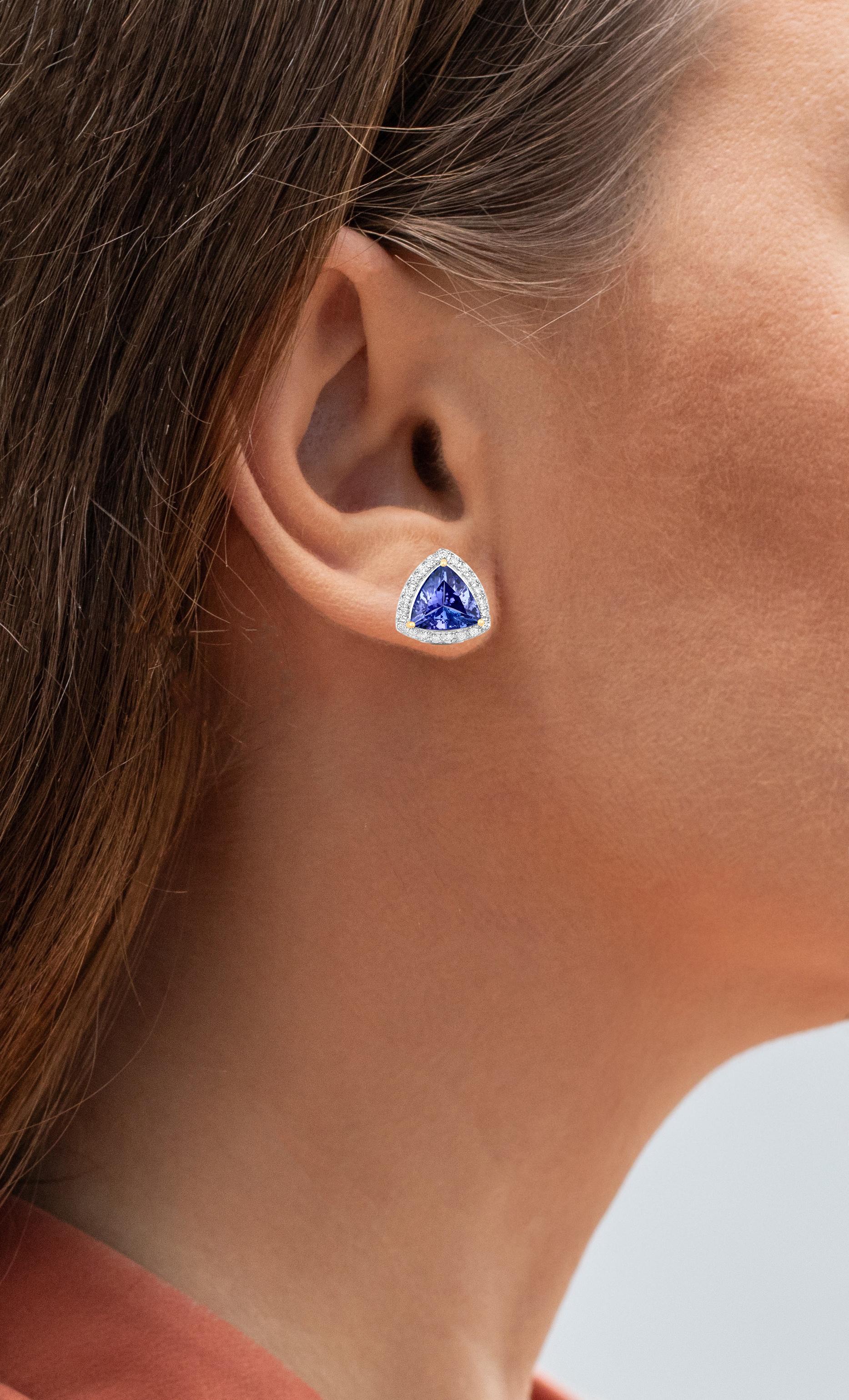 It comes with the appraisal by GIA GG/AJP
All Gemstones are Natural
2 Trillion Tanzanites  = 3.48 Carats
42 Diamonds = 0.34 Carats
Metal: 14K Yellow Gold
Dimensions: 11 x 11 mm

