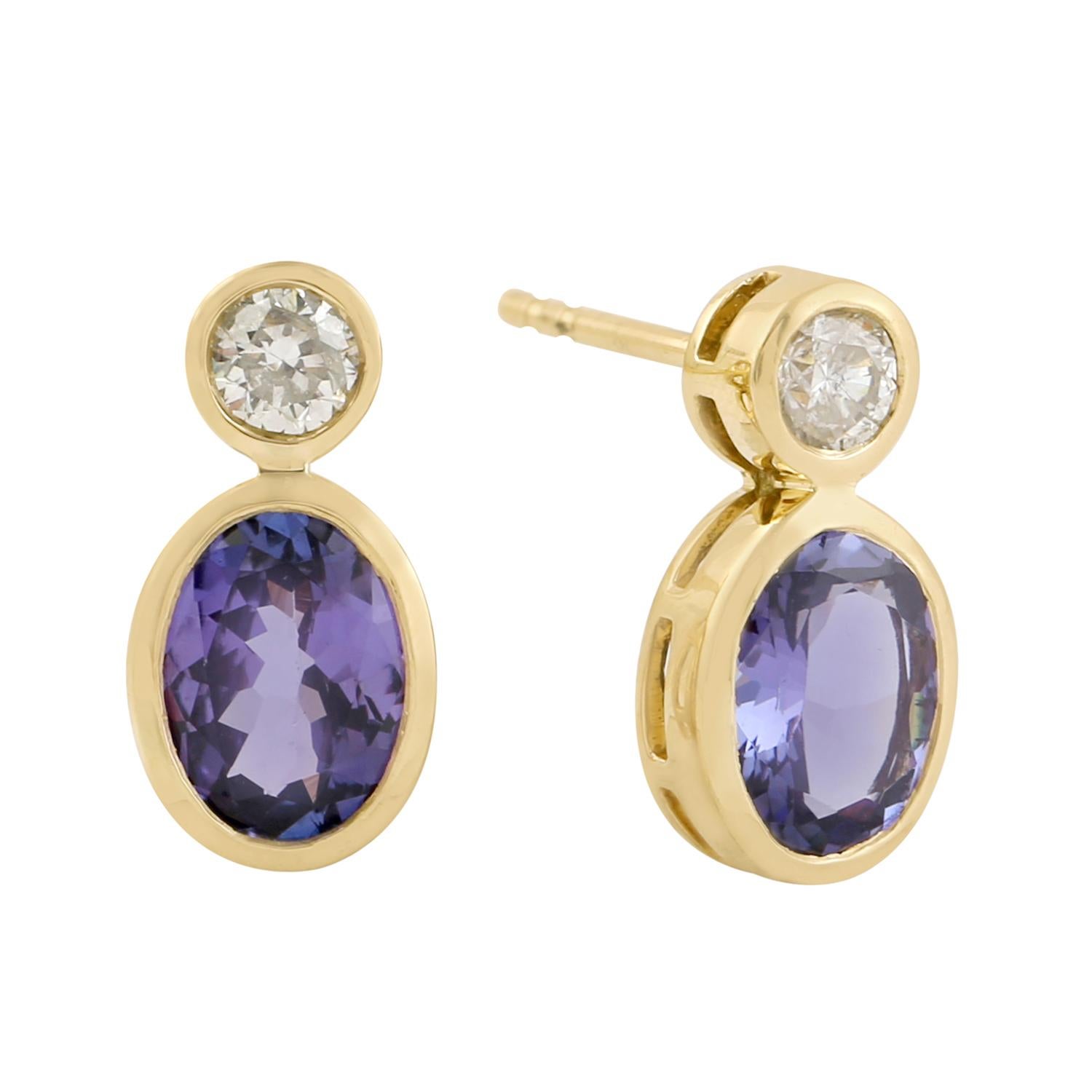 Art Déco Orecchini ovali con tanzanite blu e diamanti in oro 18 carati in vendita