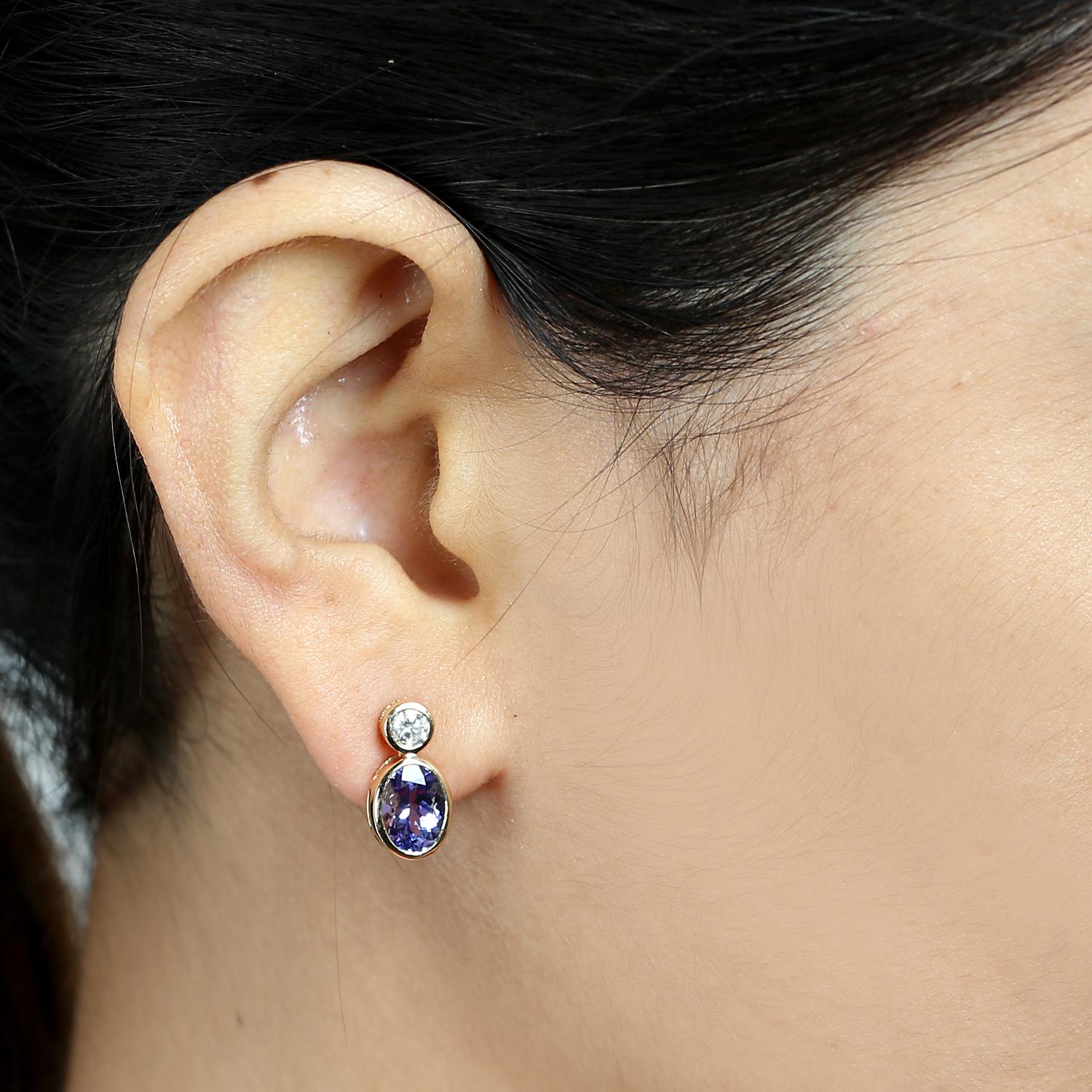 Mixed Cut Oval Shaped Blue Tanzanite Stud Earrings with Diamonds Made in 18k Gold For Sale