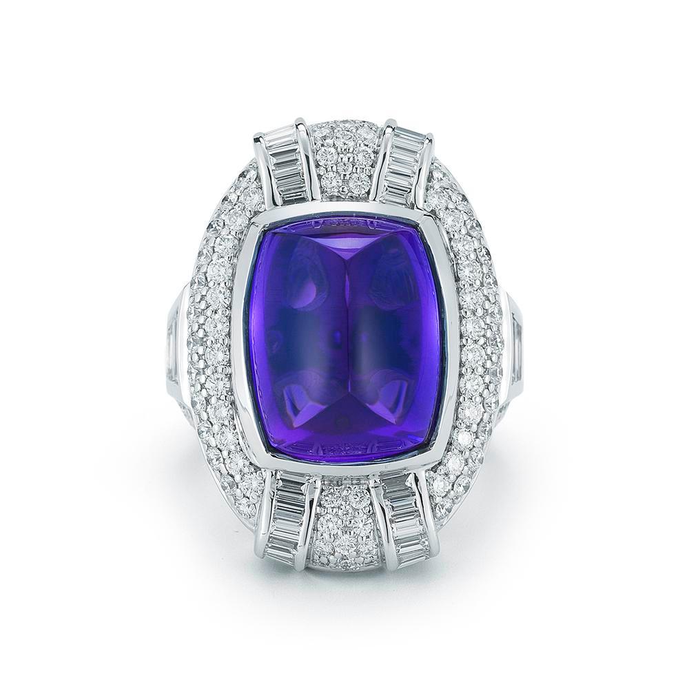 ROYAL TANZANITE RING
A truly magnificent sugarloaf Tanzanite is set in a dramatic stone-led design.

Item:	# 01669
Setting:	18K W
Color Weight:	20.4 ct. of Tanzanite
Diamond Weight:	3.54 ct. of Diamonds