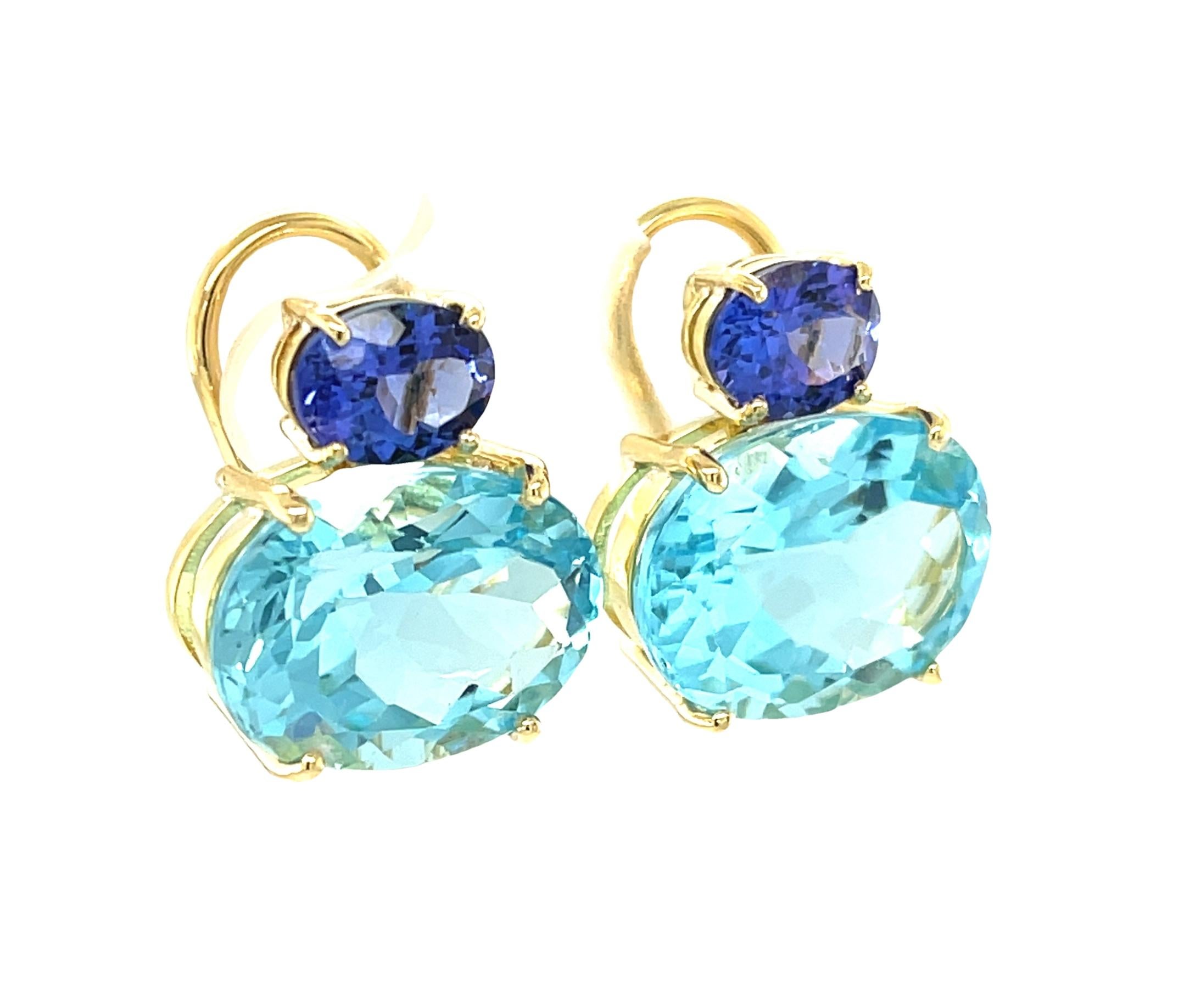 Oval Cut Tanzanite & Swiss Blue Topaz Earrings in 18k Yellow Gold with Omega Backs For Sale