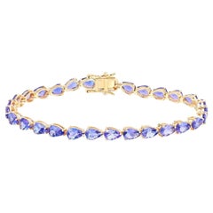 Bracelet de tennis en tanzanite 10,7 carats or jaune 14K