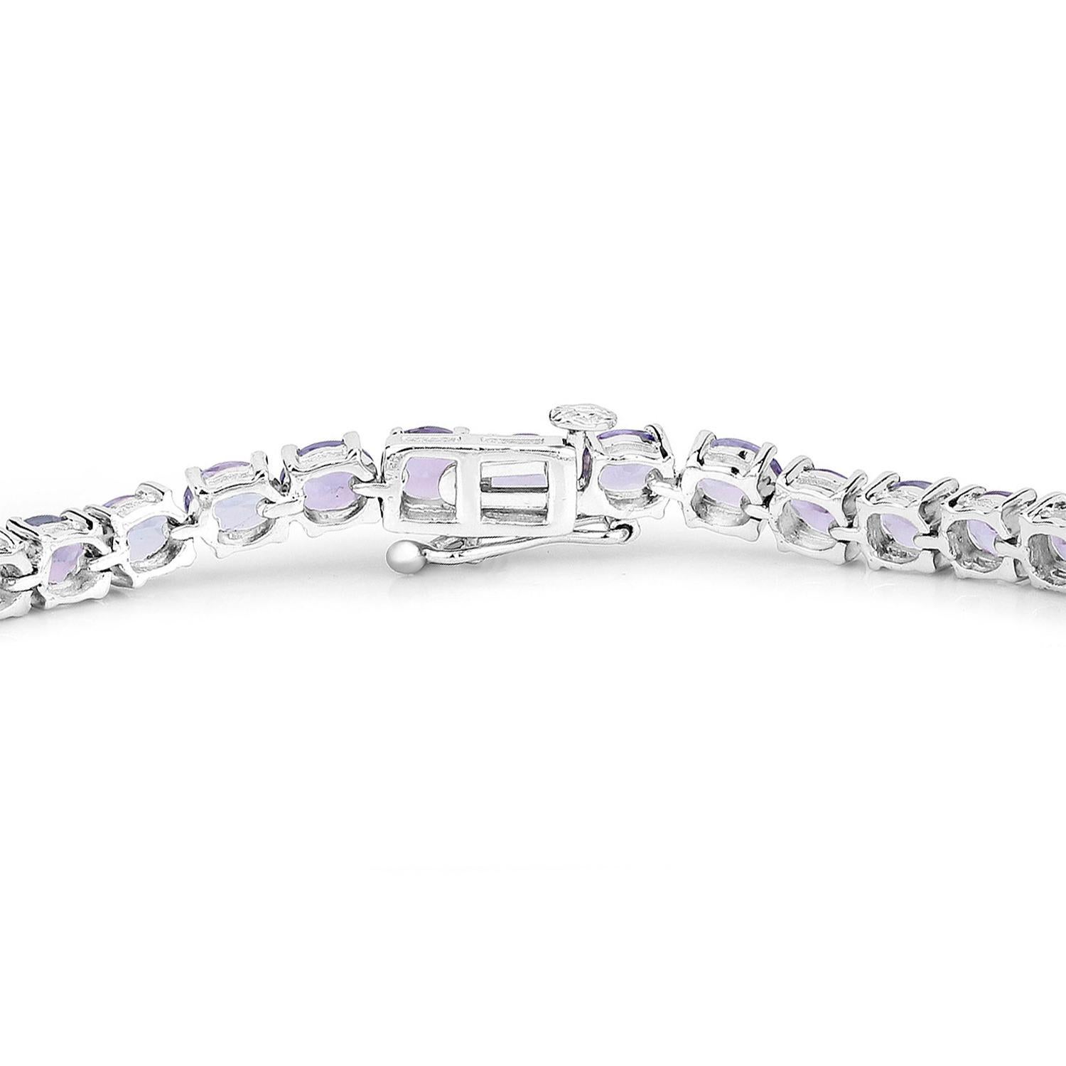 Oval Cut Tanzanite Tennis Bracelet 12.2 Carats Sterling Silver For Sale