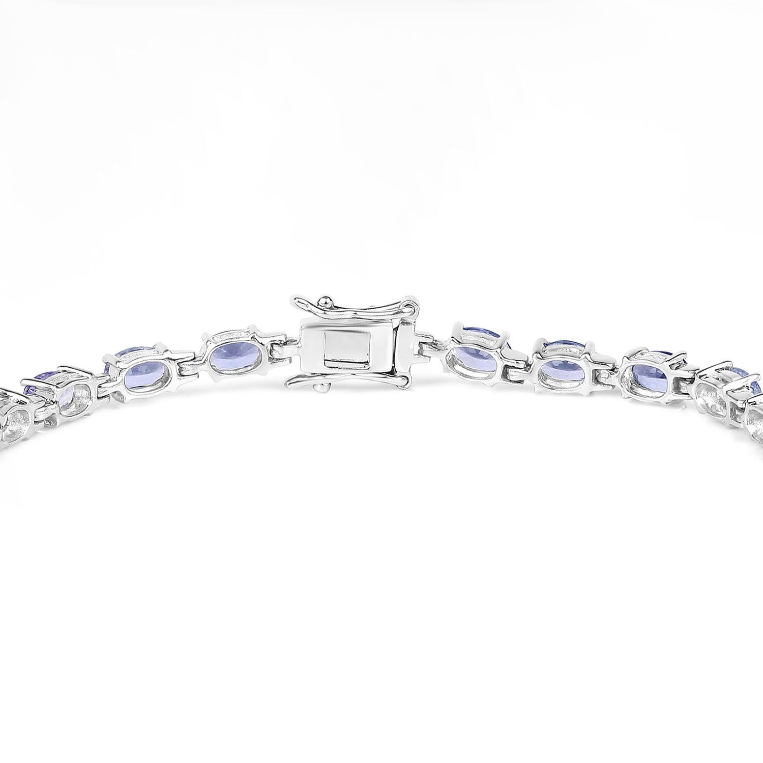 Oval Cut Tanzanite Tennis Bracelet 9.7 Carats Sterling Silver For Sale