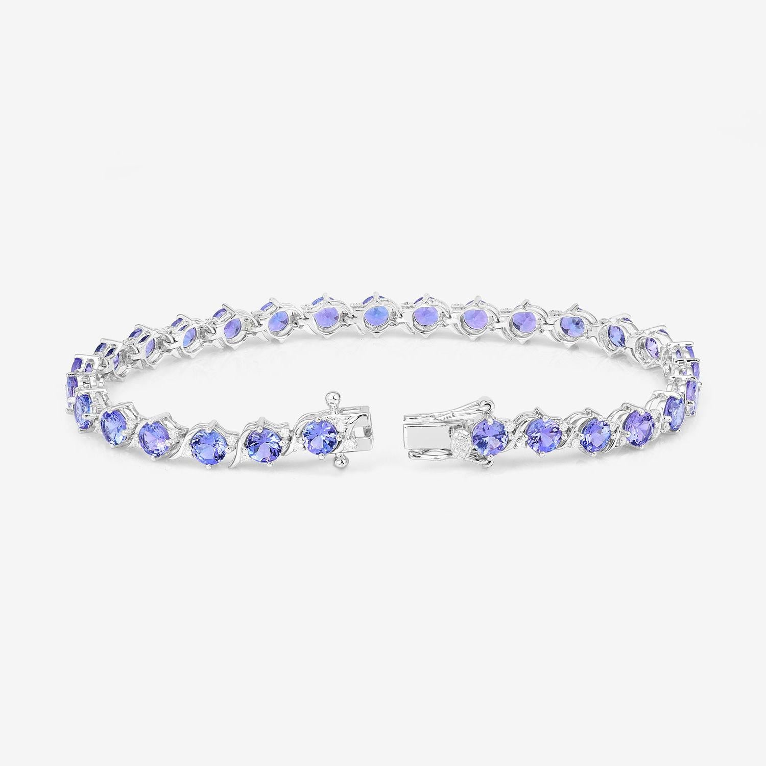 Brazalete de tenis de tanzanita Diamantes 6,9 quilates Oro blanco de 14 quilates en Excelente estado para la venta en Punta Gorda, FL