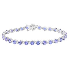 Brazalete de tenis de tanzanita Diamantes 6,9 quilates Oro blanco de 14 quilates