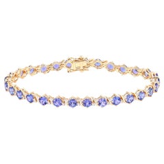 Bracelet de tennis en tanzanite Diamants 6.9 Carats Or jaune 14K