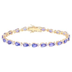 Tanzanite Tennis Bracelet Diamonds 8.2 Carats 14K Yellow Gold