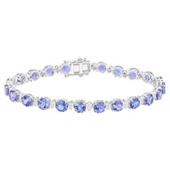 Brazalete de tenis de tanzanita Diamantes 9,8 quilates Oro blanco de 14 quilates