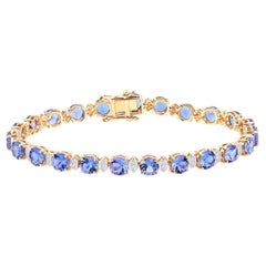 Bracelet de tennis en tanzanite Diamants 9.8 Carats Or jaune 14K