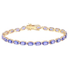 Tanzanite Tennis Bracelet White Diamonds 10.8 Carats 14K Yellow Gold