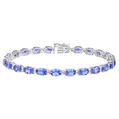 Bracelet tennis en or blanc 14 carats avec tanzanites et diamants 10,87 carats