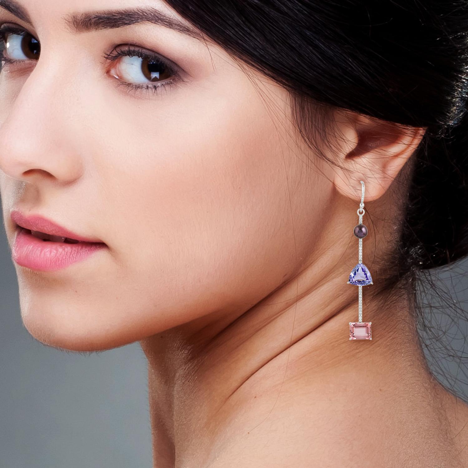 These beautiful linear drop earring are handcrafted in 18-karat gold. It is set with 7.94 carats tanzanite, 4.1 carats pearl, tourmaline and .32 carats of diamonds.

FOLLOW  MEGHNA JEWELS storefront to view the latest collection & exclusive pieces. 