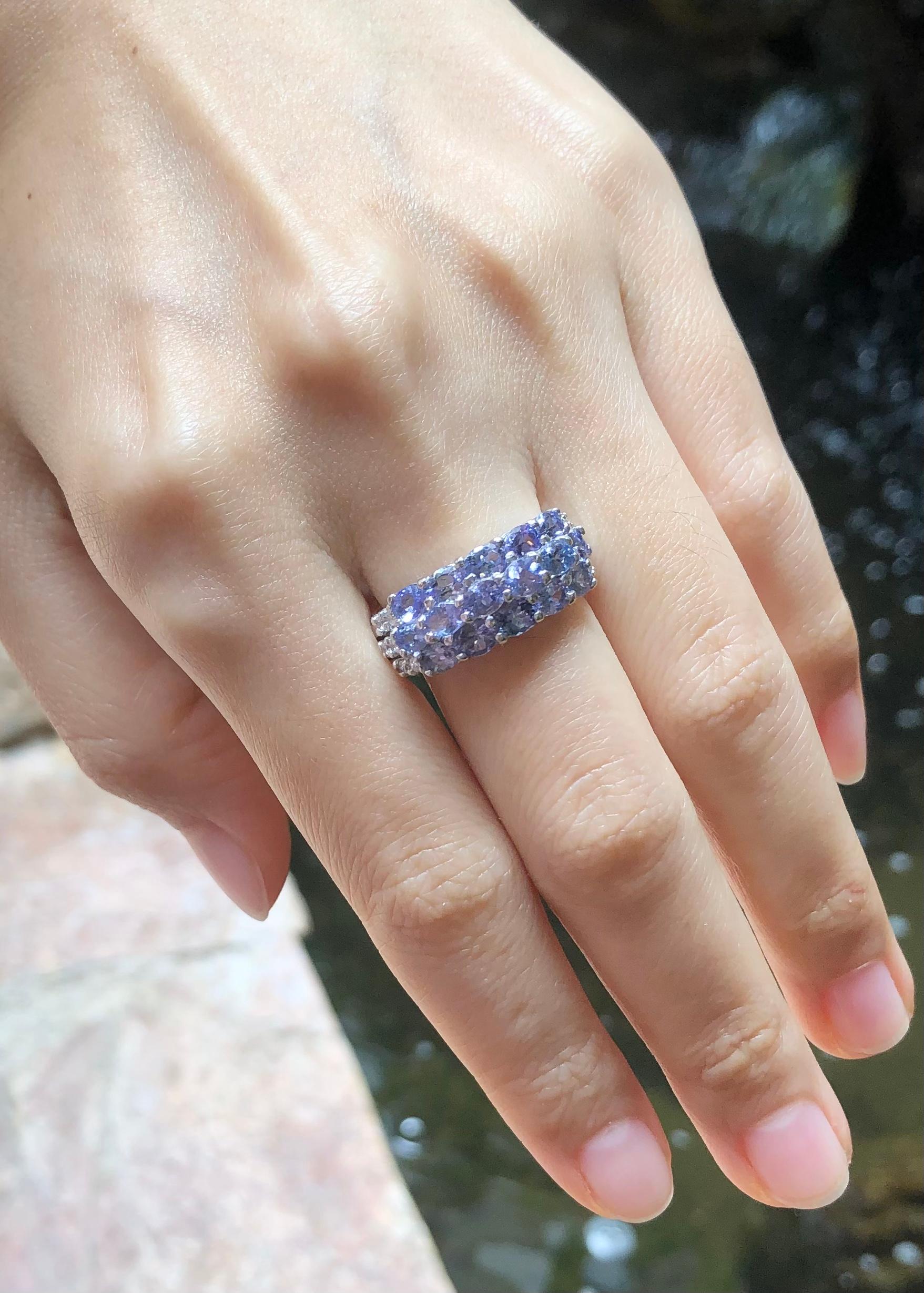 Contemporary Tanzanite with Cubic Zirconia Ring set in Silver Settings For Sale