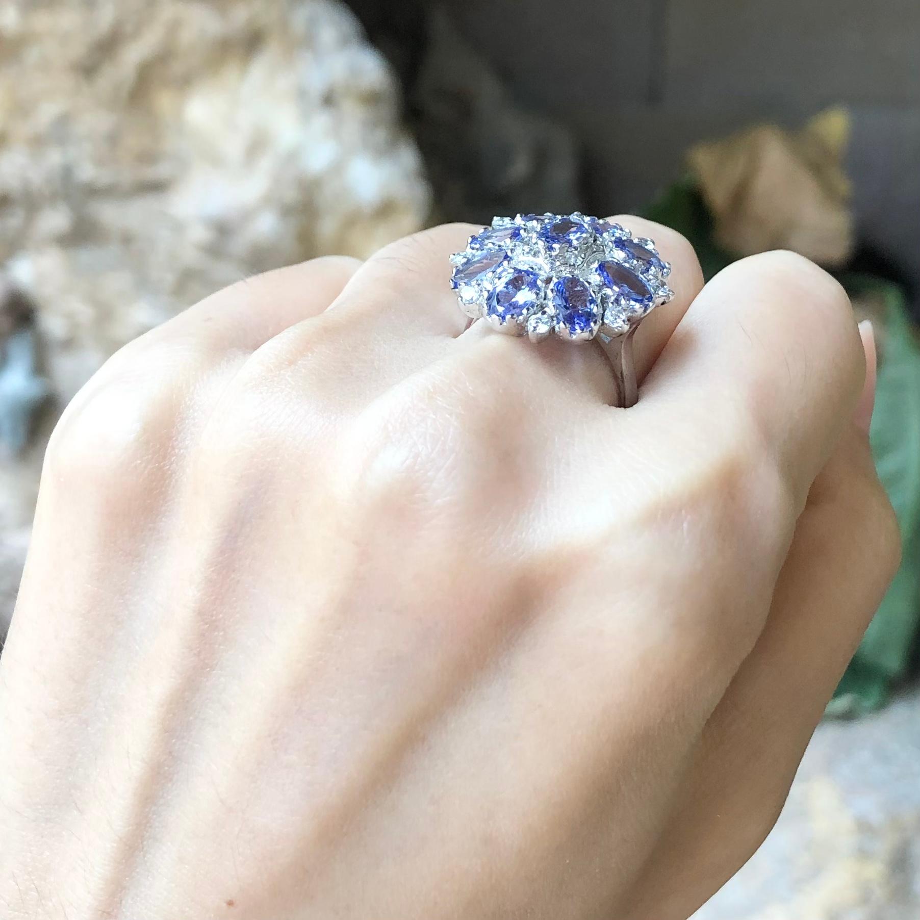 Oval Cut Tanzanite with Cubic Zirconia Ring set in Silver Settings For Sale