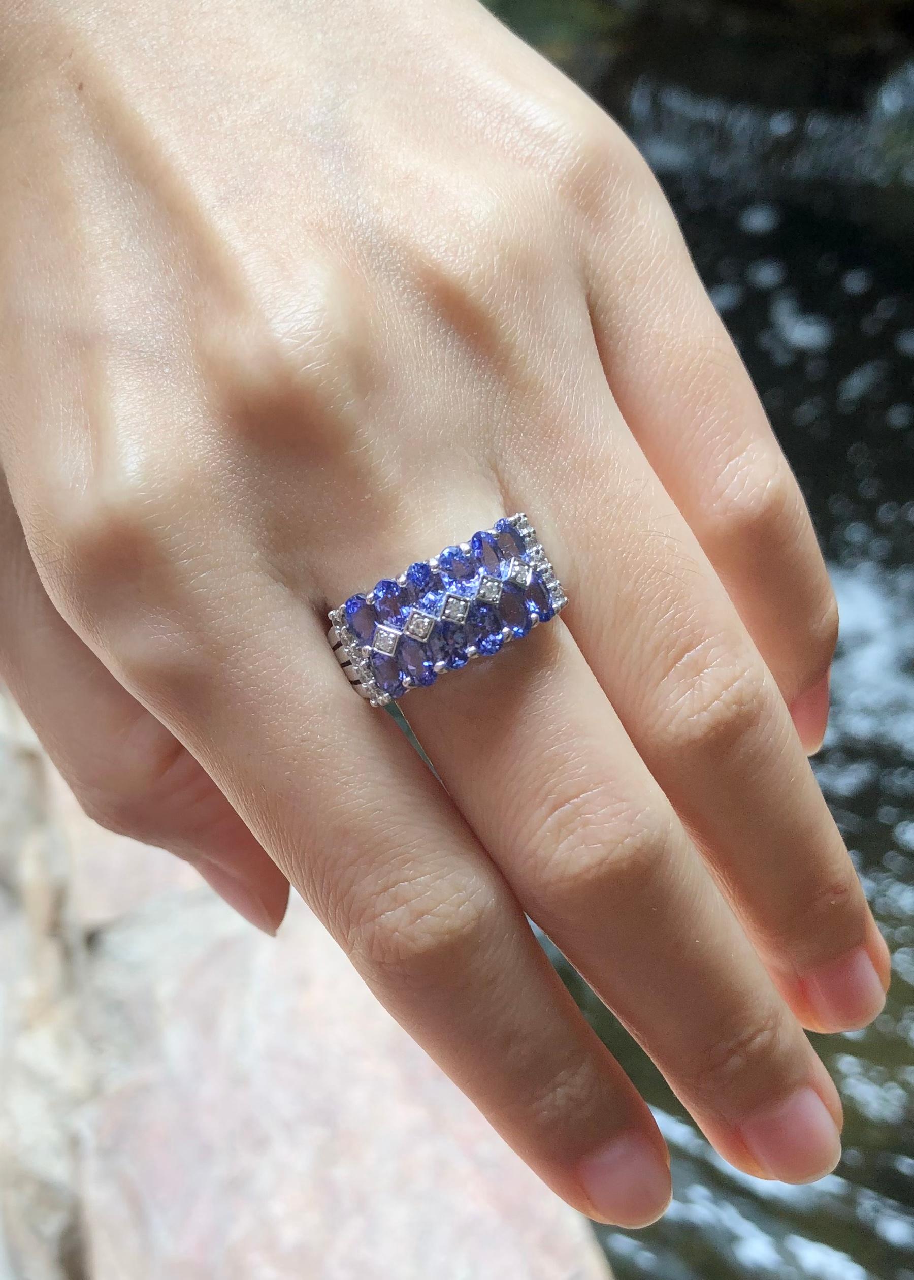 Oval Cut Tanzanite with Cubic Zirconia Ring set in Silver Settings For Sale