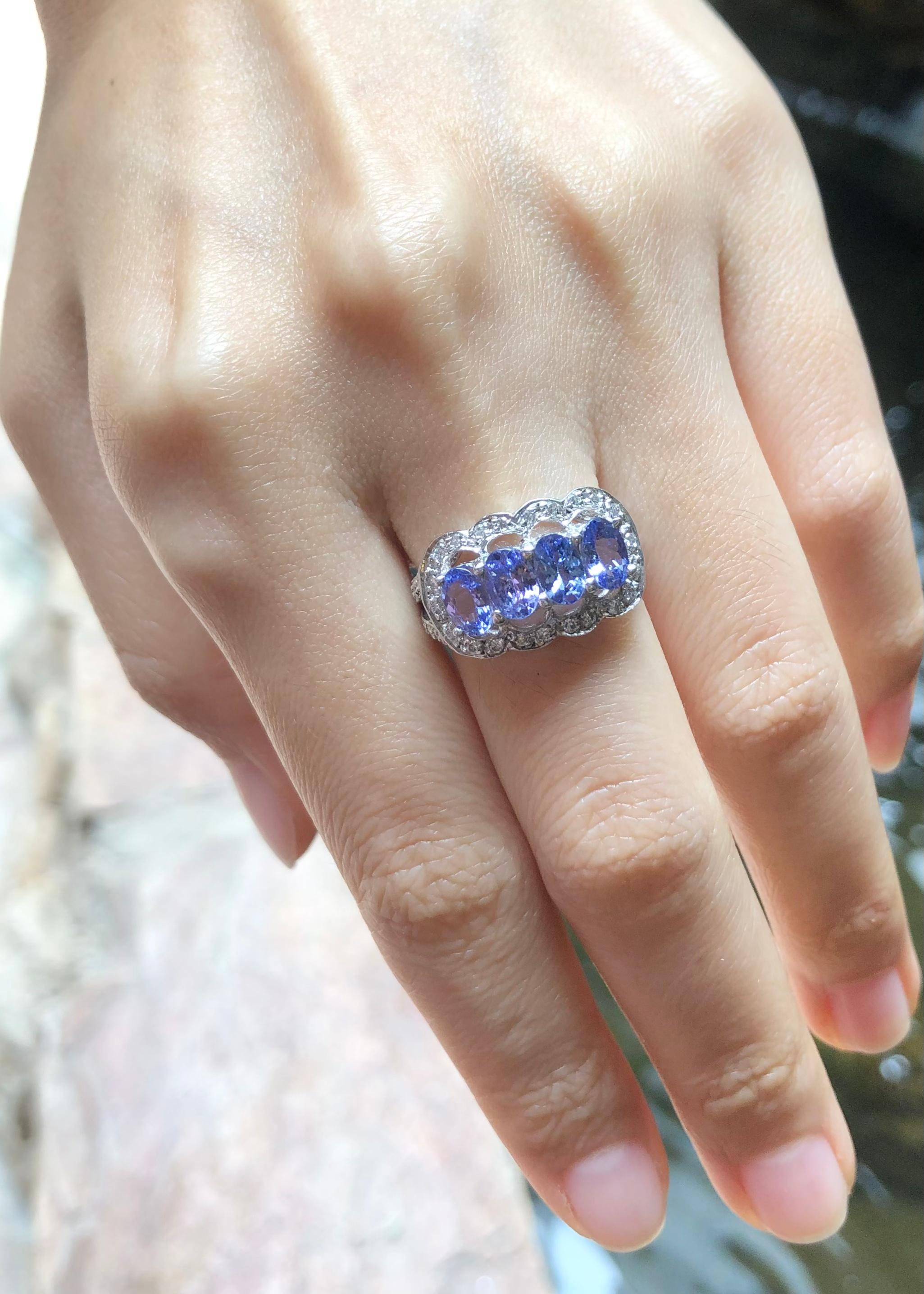 Women's Tanzanite with Cubic Zirconia Ring set in Silver Settings For Sale