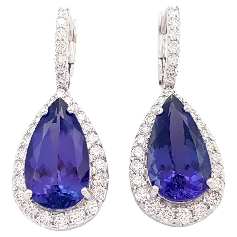 Anello in Oro Bianco 18k con Rubino 3,88 ct e Tanzanite 1,55 ct | Cler