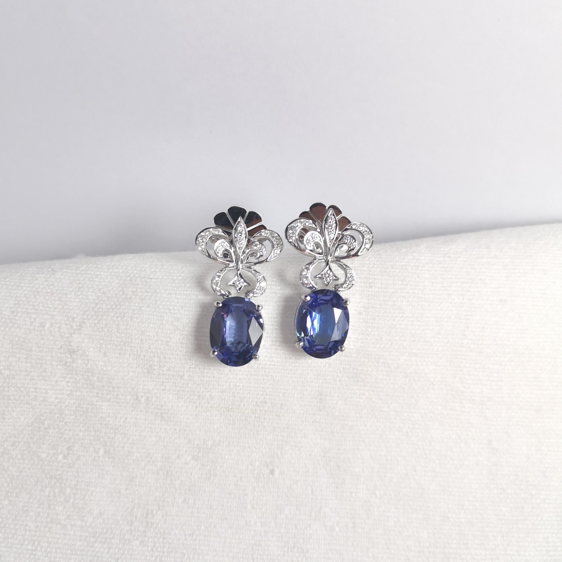 Oval Cut Tanzanite with Diamond Fleur-De-Lis Earrings set in 18K White Gold Settings For Sale