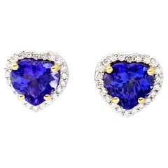 Boucles d'oreilles Tanzanite et diamant en forme de coeur montées sur or jaune/blanc 18K