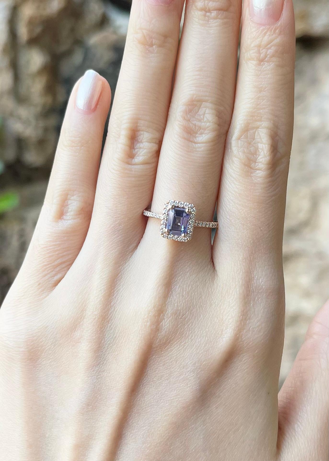 Tanzanite 1.05 carats with Diamond 0.32 carat Ring set in 18K Rose Gold Settings

Width:  0.8 cm 
Length: 1.0 cm
Ring Size: 54
Total Weight: 3.51 grams

