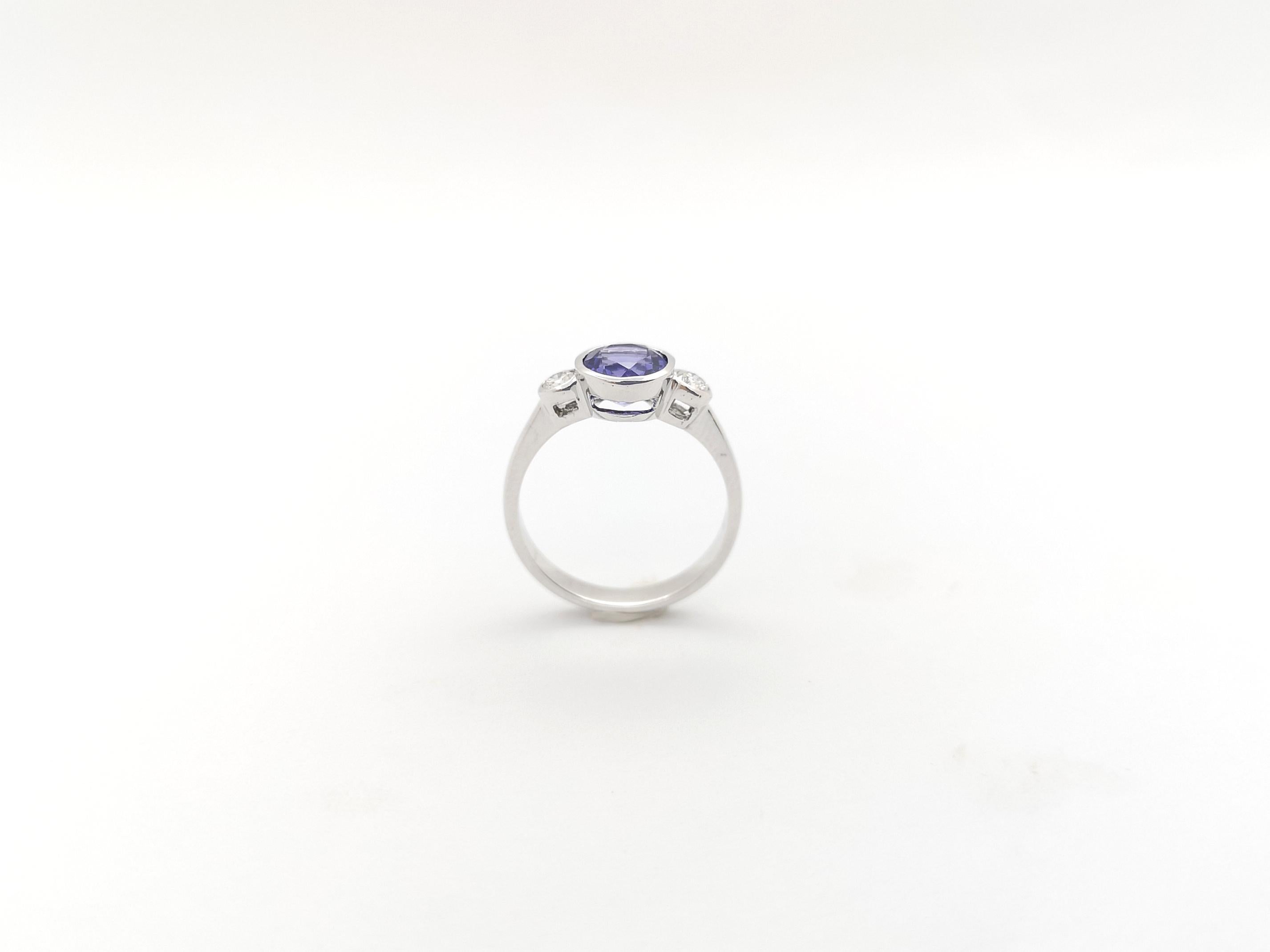 Tanzanite with Diamond Ring set in 18K White Gold Setting For Sale 8