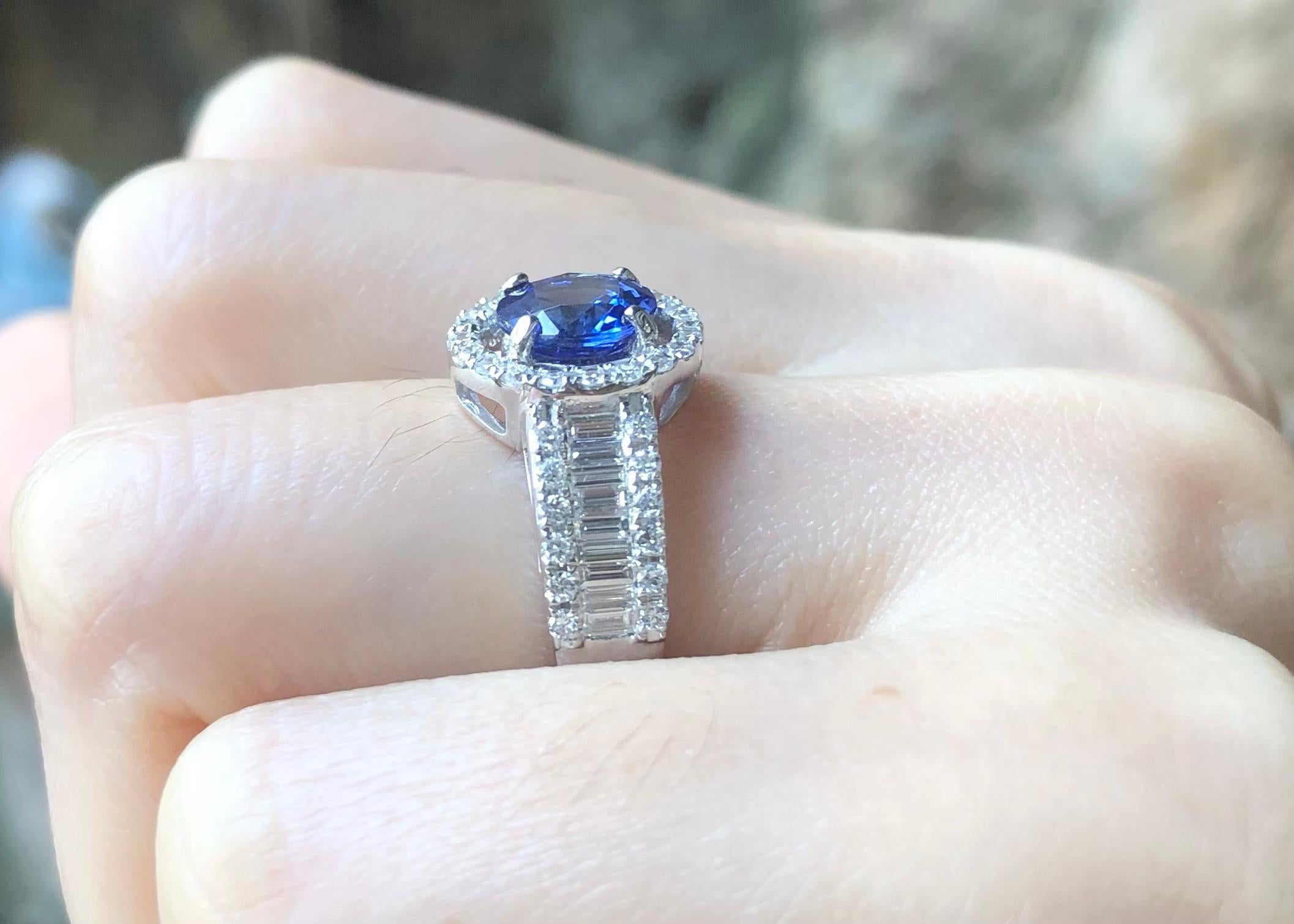 Tanzanite 1.31 carats with Diamond 0.84 carat Ring set in 18K White Gold Settings

Width:  1.2 cm 
Length: 1.2 cm
Ring Size: 49
Total Weight: 4.6 grams

