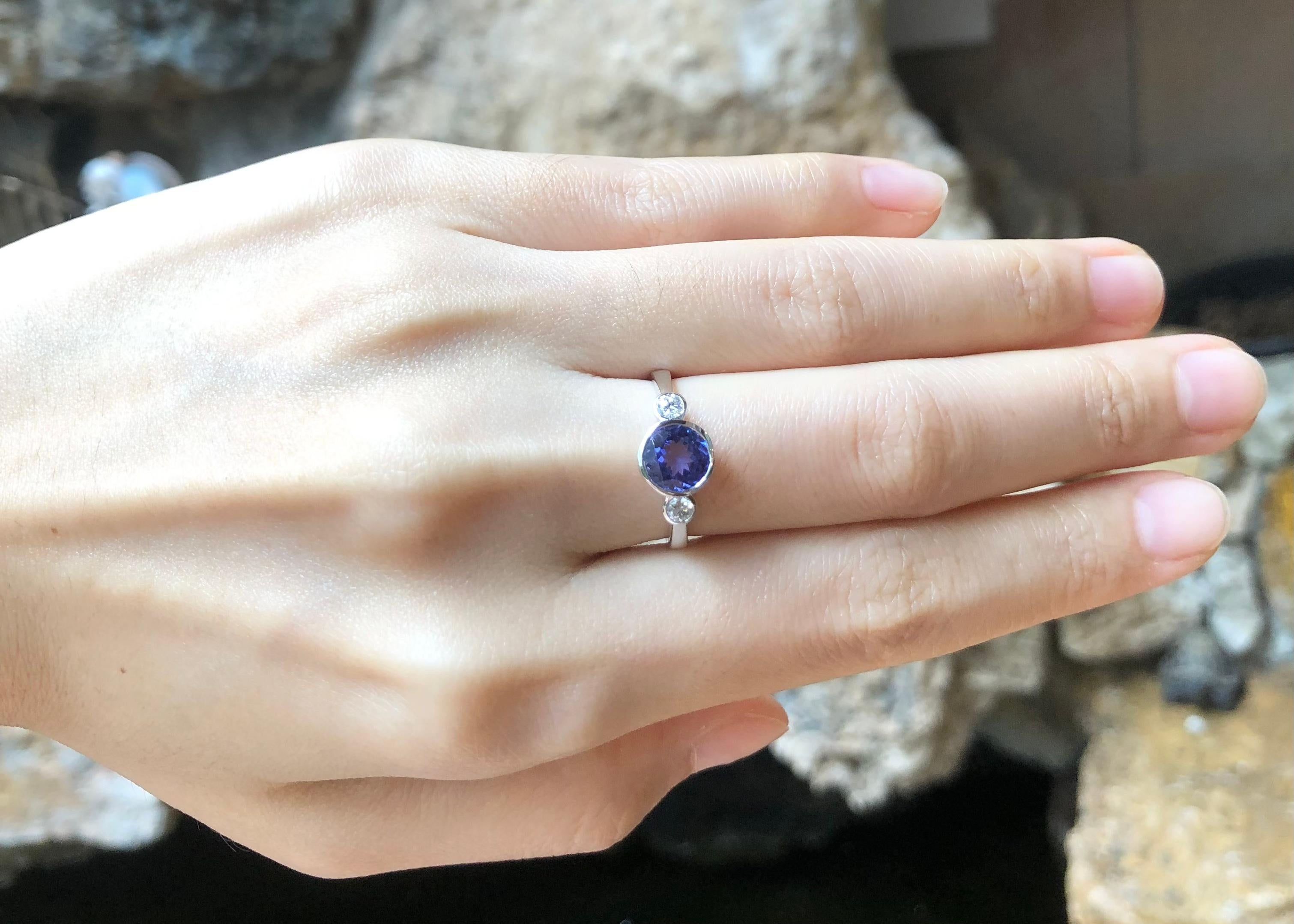 Tanzanite 1.48 carats with Diamond 0.17 carat Ring set in 18K White Gold Settings

Width:  1.3 cm 
Length: 0.8 cm
Ring Size: 51
Total Weight: 3.10 grams


