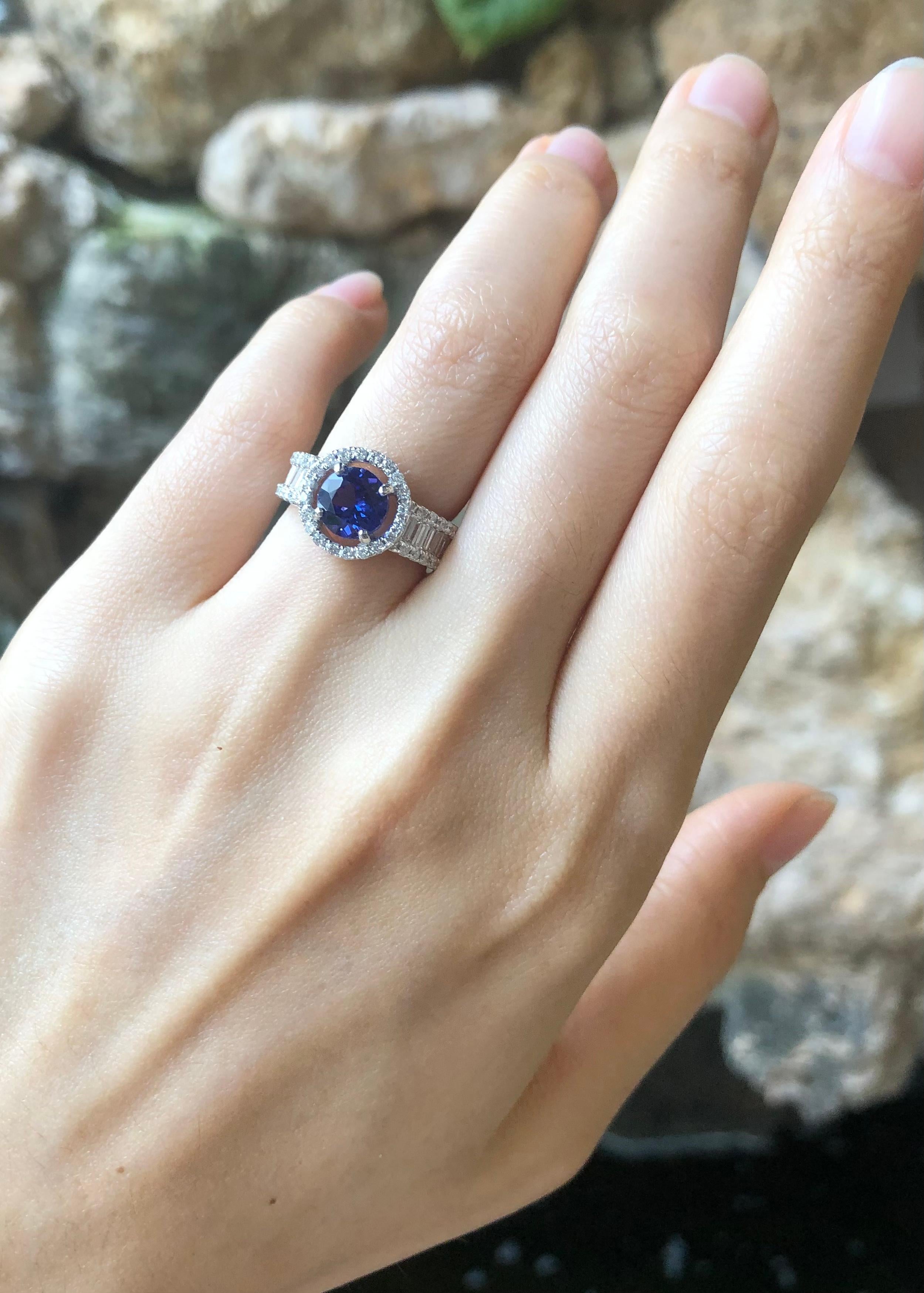 Contemporary Tanzanite with Diamond Ring Set in 18K White Gold Setting For Sale