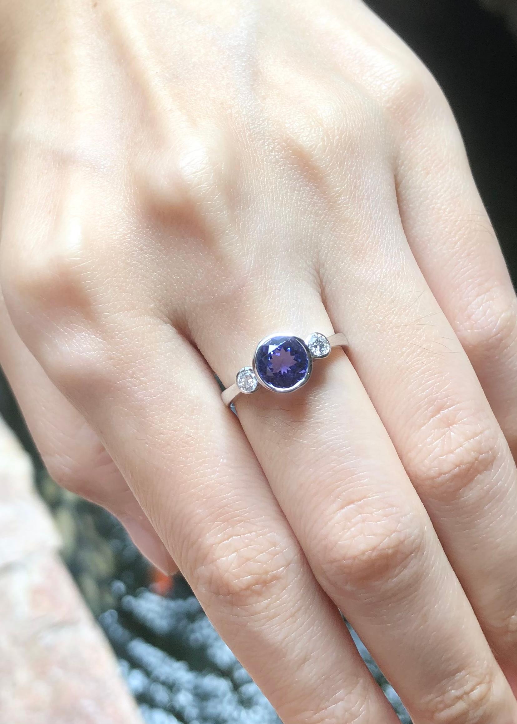 Contemporary Tanzanite with Diamond Ring set in 18K White Gold Setting For Sale