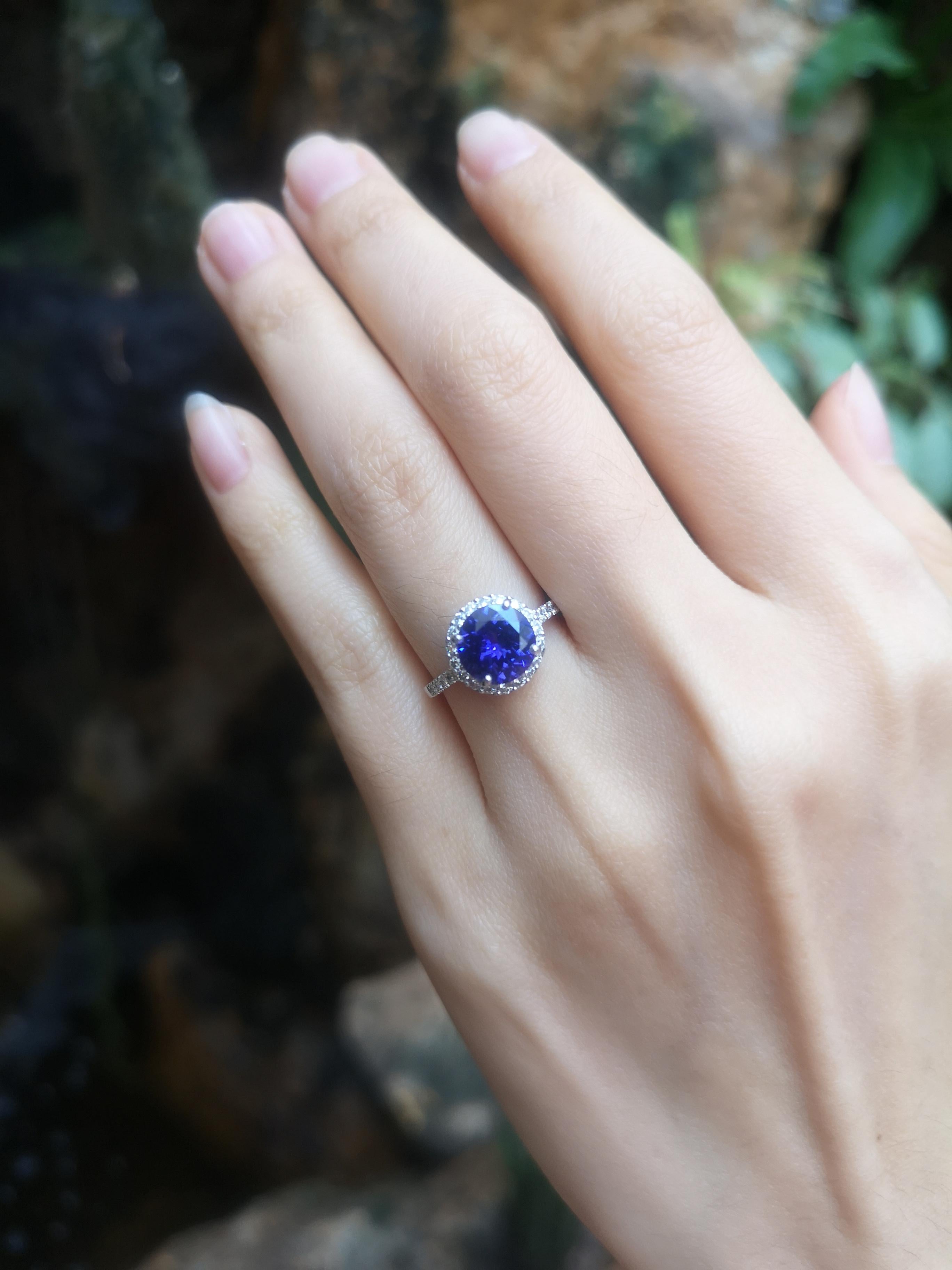 Women's Round Cut Tanzanite with Diamond Ring Set in Platinum 950 Settings For Sale