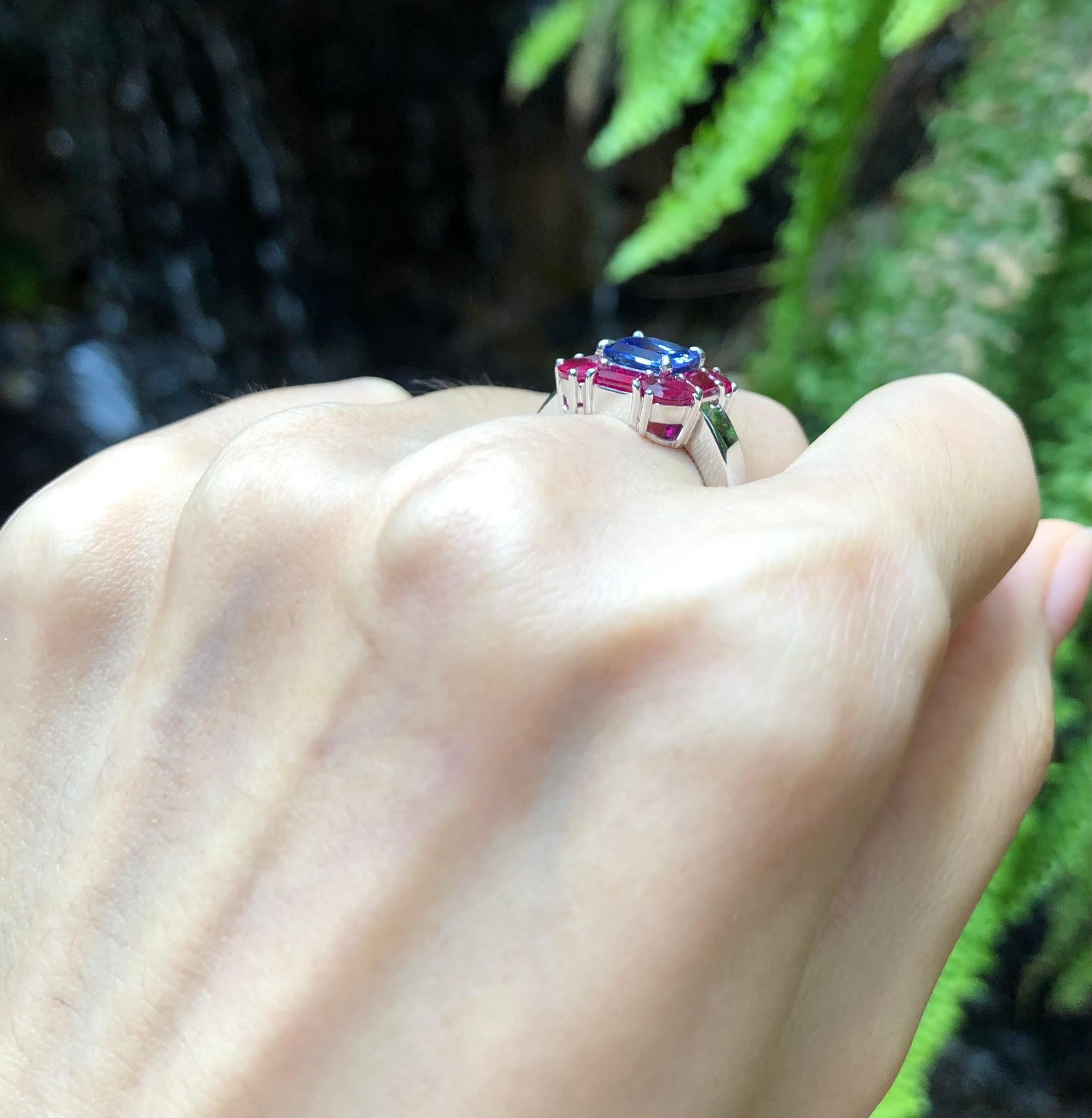 Tanzanite 1.38 carats with Ruby 2.5 carats Ring set in 18 Karat White Gold Settings

Width:  1.2 cm 
Length: 1.2 cm
Ring Size: 51
Total Weight: 7.96 grams

